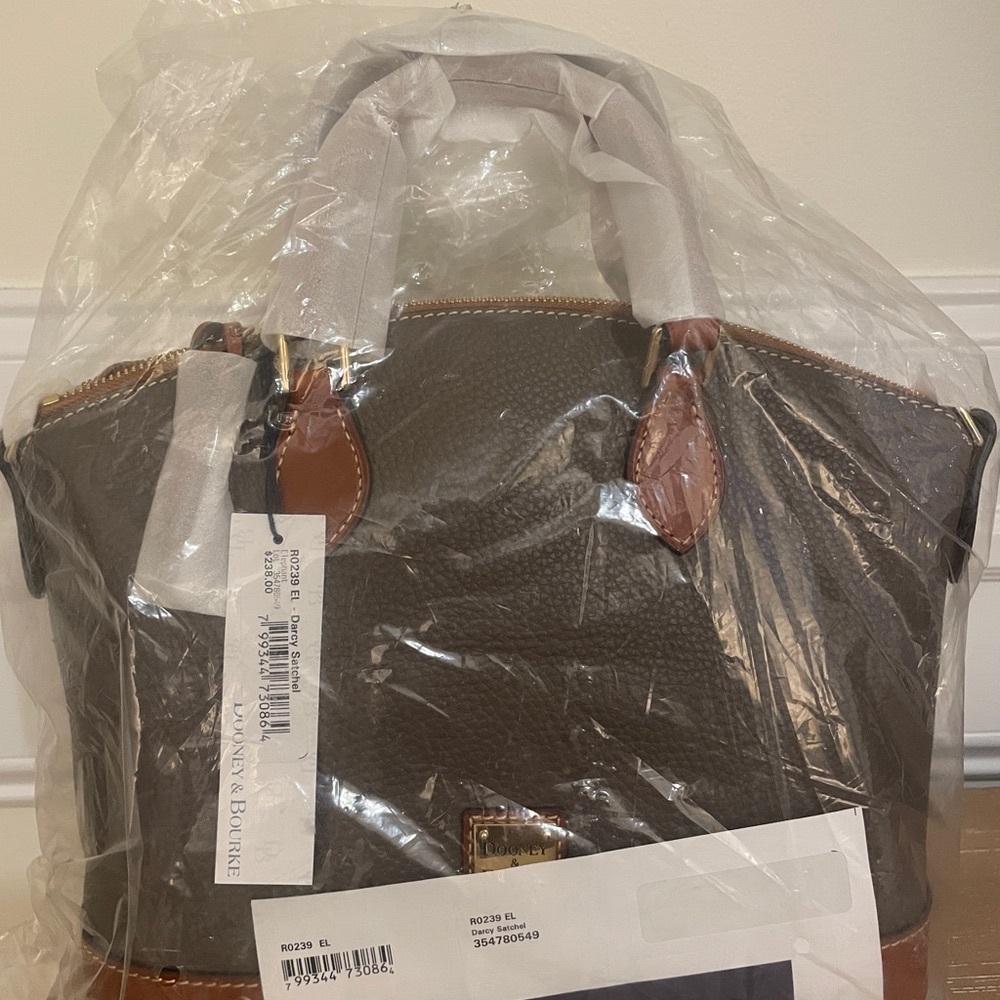 New. Never used. Dooney & Bourke Dome Handbag 
Pebble Grain Zip Zip Satchel